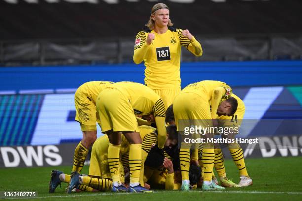 Mahmoud Dahoud of Borussia Dortmund celebrates with teammates after scoring their team's third goal during the Bundesliga match between Eintracht...
