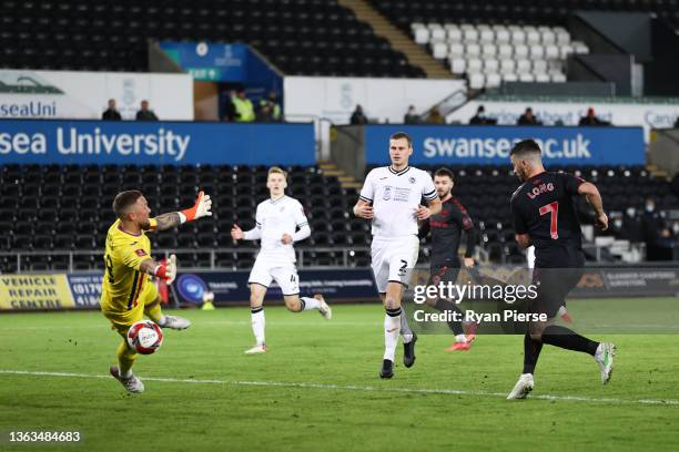 Shane Long of Southampton scores their team's third goal during the Emirates FA Cup Third Round match between Swansea City and Southampton at...