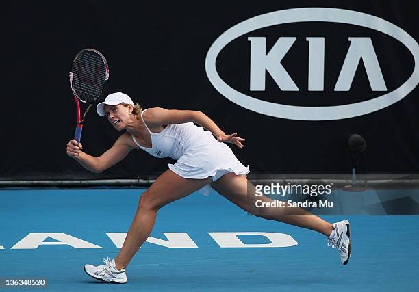 Greta Arn of Hungary plays a shot in her match against Julia Goerges of Germany during day two of the 2012 ASB Classic at ASB Tennis Centre on...