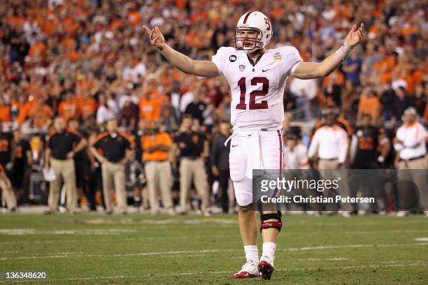 Andrew Luck of the Stanford Cardinal reacts against the Oklahoma State Cowboys during the Tostitos Fiesta Bowl on January 2, 2012 at University of...