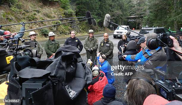 Kevin Bacher, Park Public Information Oficer; Chuck Young, Chief Ranger; Ed Troyer, Pierce County Sheriff's Department spokesperson; Randy King, Park...