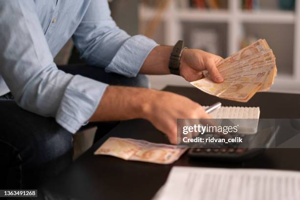 person counting turkish banknotes - bill bildbanksfoton och bilder