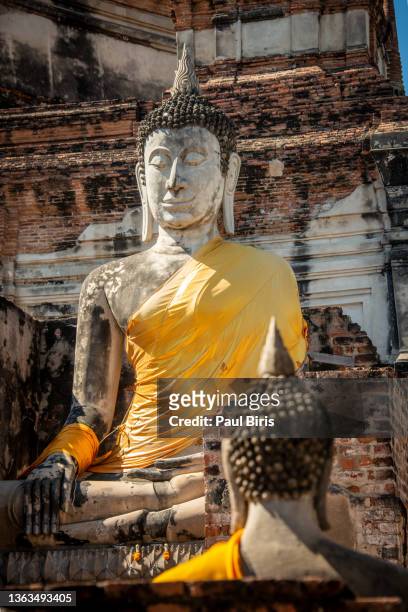 buddha statue in wat yai chai mongkol- ayuttaya of thailand - ayuthaya imagens e fotografias de stock