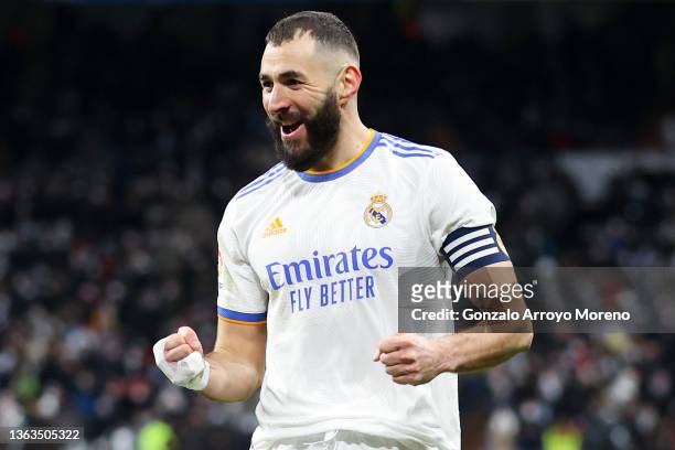 Karim Benzema of Real Madrid CF celebrates after scoring his team's fourth goal during the La Liga Santader match between Real Madrid CF and Valencia...