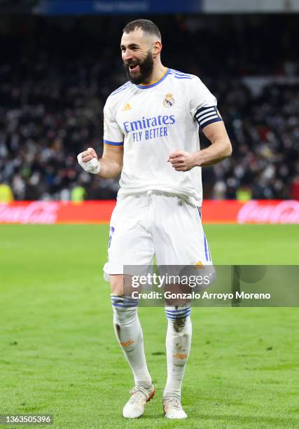 Karim Benzema of Real Madrid CF celebrates after scoring his team's fourth goal during the La Liga Santader match between Real Madrid CF and Valencia...