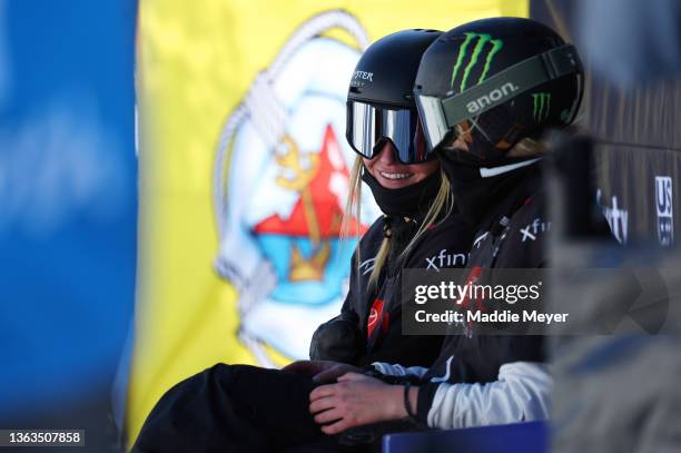 Jamie Anderson of Team United States talks to Zoi Sadowski Synnott of Team New Zealand during the Women's Snowboard Slopestyle competition at the...