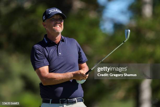 Matt Jones of Australia watches his shot from the second tee during the third round of the Sentry Tournament of Champions at the Plantation Course at...