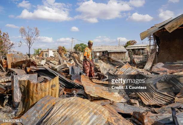 Ali Adem of Darsageta walks through the wreckage that was once his home and business on January 07, 2022 in Darsageta, Ethiopia. During the TPLF...