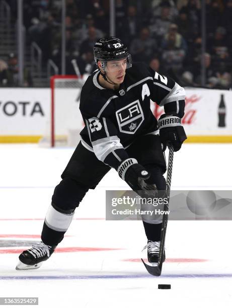 Dustin Brown of the Los Angeles Kings carries the puck during a 4-2 loss to the Nashville Predators at Staples Center on January 06, 2022 in Los...