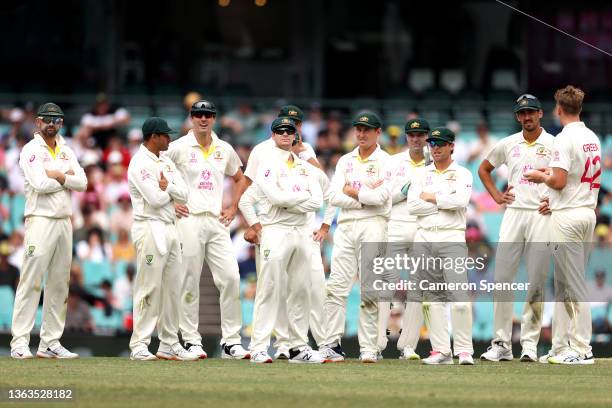 Australia look up at the replay after the dismissal of Zak Crawley of England by Cameron Green of Australia during day five of the Fourth Test Match...