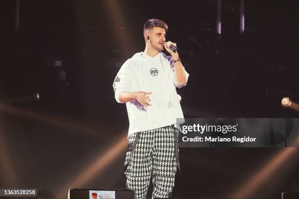 Spanish singer Nau from Adexe & Nau performs on stage during 'Mas Fuertes que el Volcan' charity concert at Wizink Center on January 08, 2022 in...