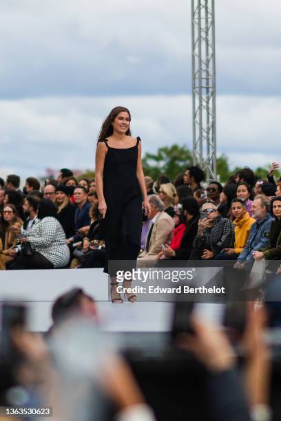 Filippa Coster-Waldau wears a black dress, and walks the runway, during the L'Oreal show, during Paris Fashion Week - Womenswear Spring Summer 2022,...