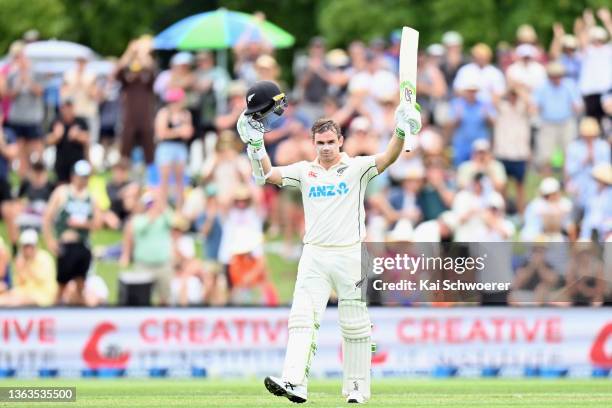 Tom Latham of New Zealand celebrates his century during day one of the Second Test match in the series between New Zealand and Bangladesh at Hagley...
