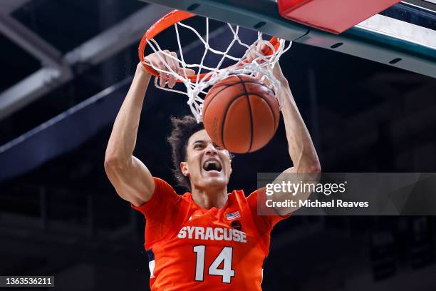 Jesse Edwards of the Syracuse Orange dunks against the Miami Hurricanes during the first half at Watsco Center on January 05, 2022 in Coral Gables,...