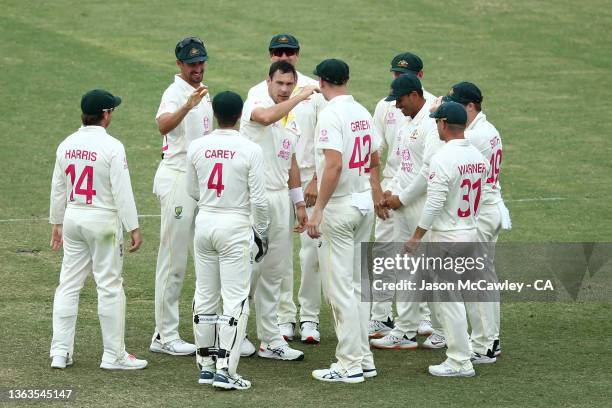 Scott Boland of Australia celebrates after taking the wicket of Joe Root of England during day five of the Fourth Test Match in the Ashes series...