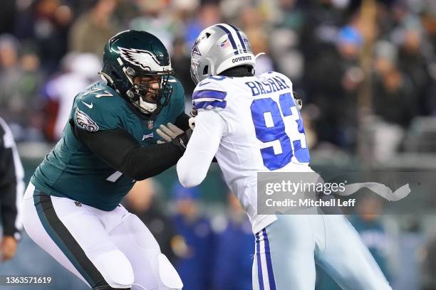 Andre Dillard of the Philadelphia Eagles blocks Tarell Basham of the Dallas Cowboys at Lincoln Financial Field on January 8, 2022 in Philadelphia,...