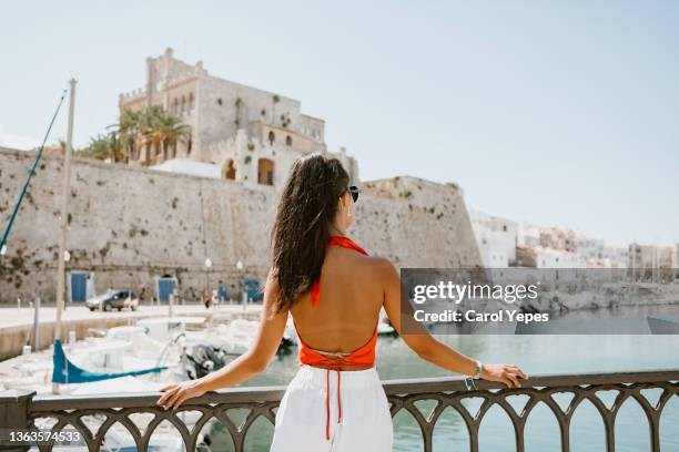 beautifu latina contemplating the beautiful port of ciudatella,minorca,balearics islands,spain - ciutadella stock pictures, royalty-free photos & images