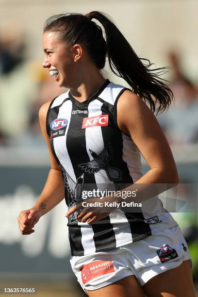 Chloe Molloy of the Magpies celebrates during the round one AFLW match between the Carlton Blues and the Collingwood Magpies at Ikon Park on January...