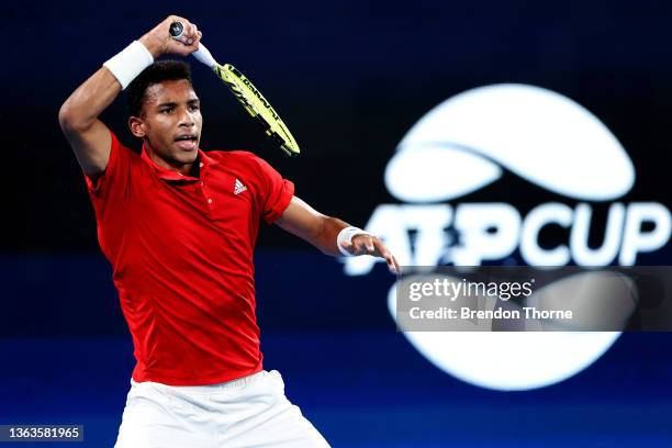 Felix Auger-Aliassime of Canada plays a forehand in his final match against Roberto Bautista Agut of Spain during the day nine 2022 ATP Cup tie...