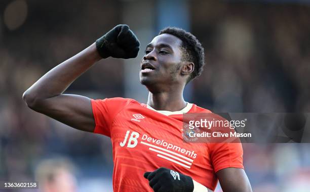 Elijah Adebayo of Luton Town celebrates after scoring their side's first goal during the Emirates FA Cup Third Round match between Luton Town and...