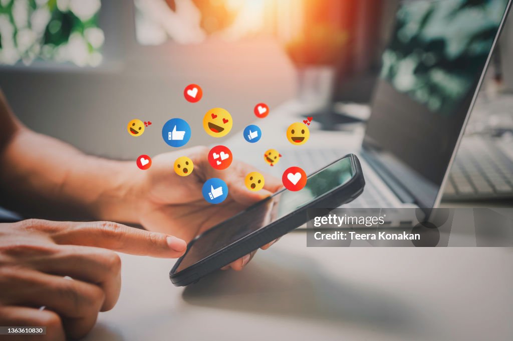 Men use smartphones to social media on vacation at home