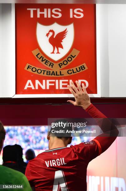 Virgil van Dijk of Liverpool leads the team out at anfield during the Emirates FA Cup Third Round match between Liverpool and Shrewsbury Town at...