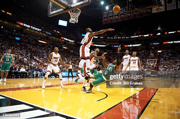 Miami Heat Dwyane Wade in action, block vs Boston Celtics Rajon Rondo at American Airlines Arena. Miami, FL CREDIT: Bill Frakes