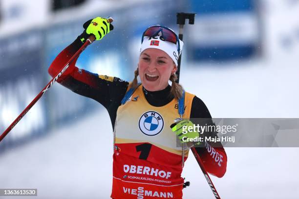 Marte Olsbu Roiseland of Norway celebrates after winning the Pursuit Women at the IBU World Cup Biathlon Oberhof at on January 09, 2022 in Oberhof,...
