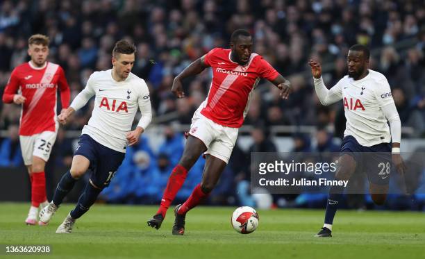Toumani Diagouraga of Morecambe is closed down by Giovani Lo Celso and Tanguy Ndombele of Tottenham Hotspur during the Emirates FA Cup Third Round...
