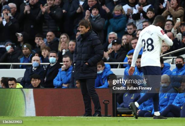 Antonio Conte, Manager of Tottenham Hotspur looks on as Tanguy Ndombele of Tottenham Hotspur leaves the pitch after being substituted during the...