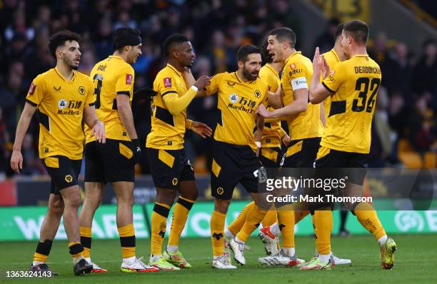 Nelson Semedo of Wolverhampton Wanderers celebrates with teammates after scoring their team's second goal during the Emirates FA Cup Third Round...