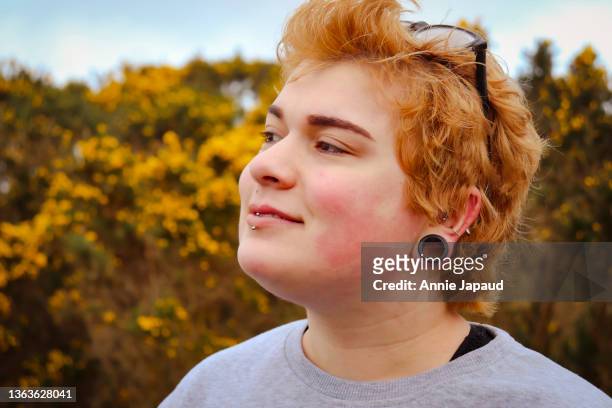 teenage girl with golden hair, closeup portrait outdoors - daily life in ireland stock pictures, royalty-free photos & images
