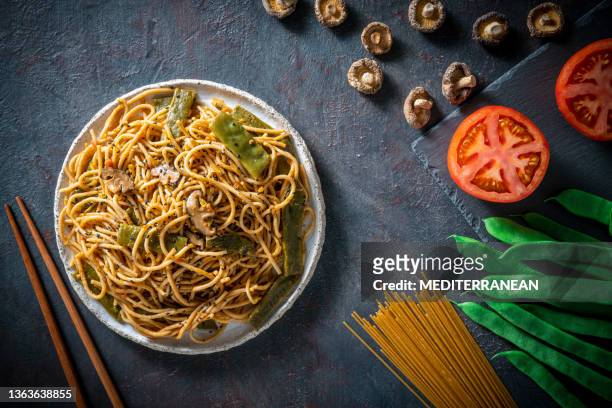 braised noodles with beans vegan plant based asian recipe - whole wheat stock pictures, royalty-free photos & images