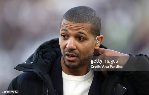 Former Leeds United player Jermaine Beckford is interviewed before the match during the Emirates FA Cup Third Round match between West Ham United and...