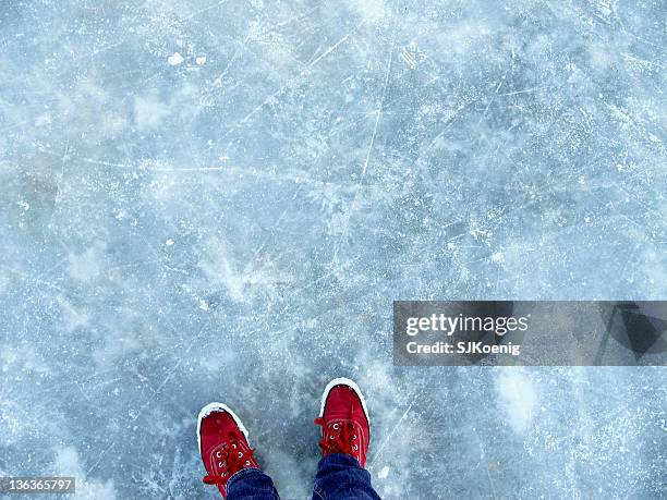 thin ice - ice rink overhead stock pictures, royalty-free photos & images