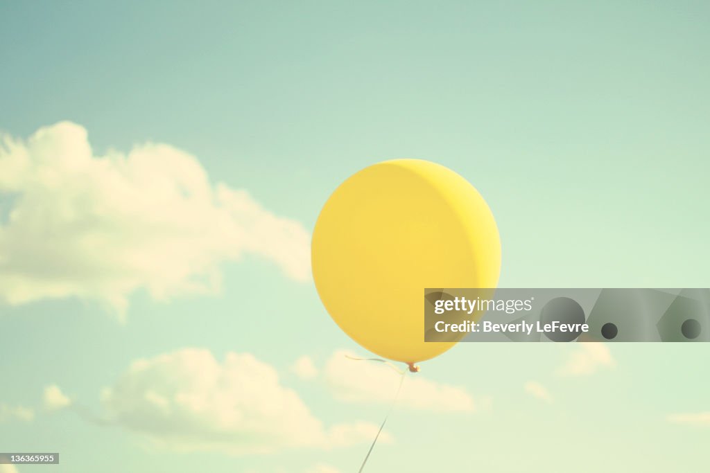 Balloon Ride Yellow Yellow Balloon High-Res Stock Photo - Getty Images