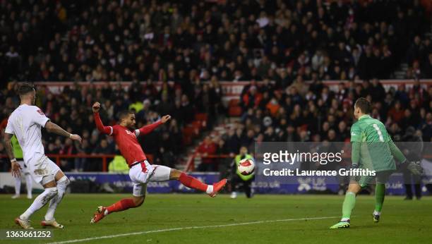 Lewis Grabban of Nottingham Forest scores their side's first goal past Bernd Leno of Arsenal during the Emirates FA Cup Third Round match between...