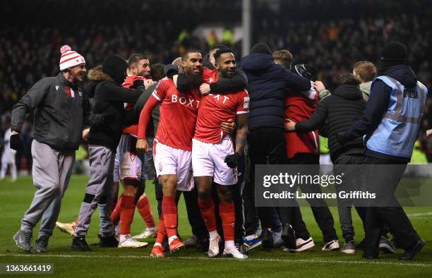 Lewis Grabban of Nottingham Forest celebrates with teammate Cafu after scoring their side's first goal during the Emirates FA Cup Third Round match...