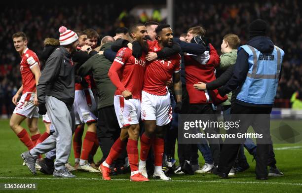 Lewis Grabban of Nottingham Forest celebrates with teammate Cafu after scoring their side's first goal during the Emirates FA Cup Third Round match...