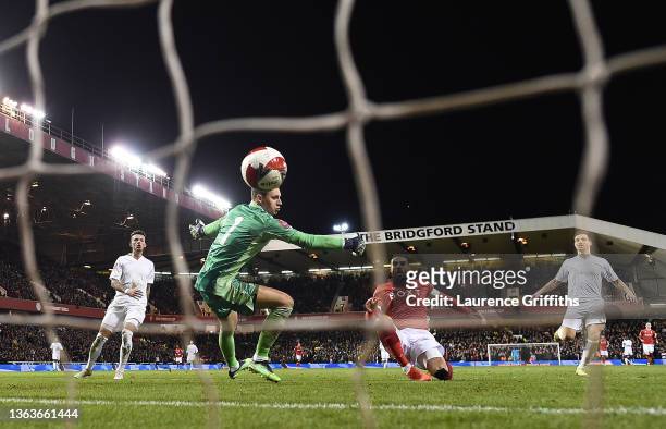 Lewis Grabban of Nottingham Forest scores their side's first goal past Bernd Leno of Arsenal during the Emirates FA Cup Third Round match between...