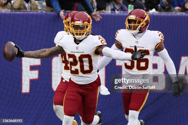 Bobby McCain of the Washington Football Team reacts after scoring a touchdown in the third quarter of the game against the New York Giants at MetLife...