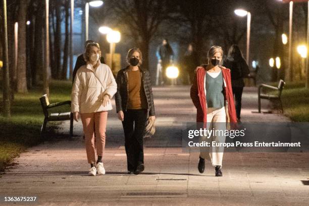 Infanta Cristina walks with her sisters-in-law Lucia Urdangarin and Laura Urdangarin on December 30 in Vitoria, Spain.