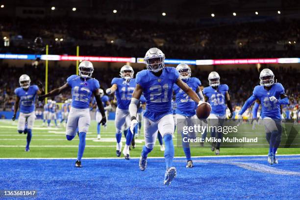 Tracy Walker III of the Detroit Lions celebrates after an interception against the Green Bay Packers during the fourth quarter at Ford Field on...