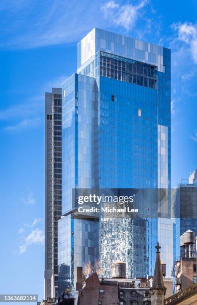 modern high rise tower with reflective glass facade in midtown manhattan - the nomad hotel stock pictures, royalty-free photos & images