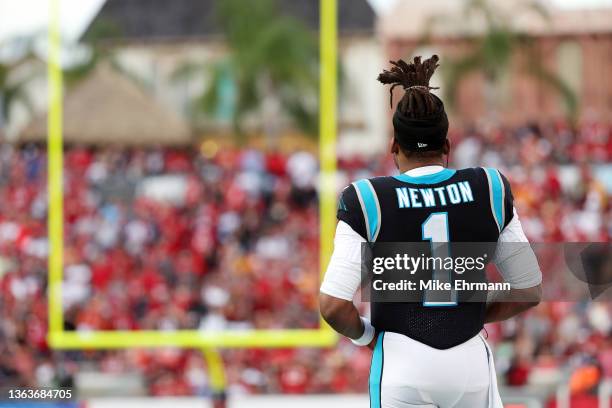 Cam Newton of the Carolina Panthers looks on during the first quarter against the Tampa Bay Buccaneers at Raymond James Stadium on January 09, 2022...