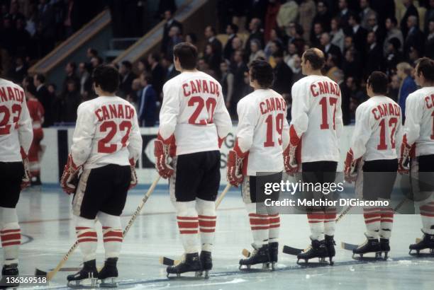Parise, Pete Mahovlich, Paul Henderson, Bill White and Yvan Cournoyer of Canada stand on the ice during introductions before Game 5 of the 1972...