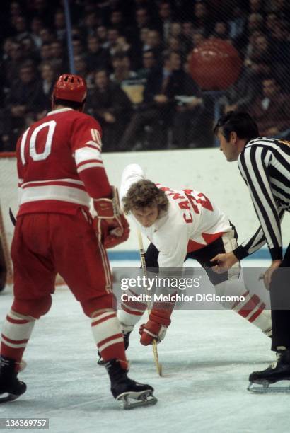 Bobby Clarke of Canada readies for the faceoff with Aleksandr Maltsev of the Soviet Union during the 1972 Summit Series at the Luzhniki Ice Palace in...