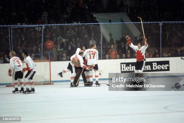 Pete Mahovlich, Bill White, goalie Ken Dryden, Phil Esposito and Gary Bergman of Canada celebrate after winning Game 6 of the 1972 Summit Series on...