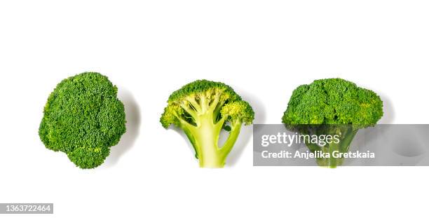 fresh broccoli isolated on white background - brocoli stock-fotos und bilder