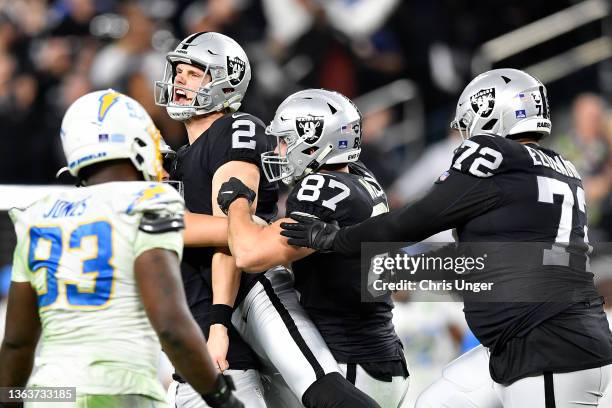 Daniel Carlson of the Las Vegas Raiders celebrates after kicking the game-winning field goal against the Los Angeles Chargers during overtime at...